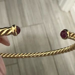 David Yurman 18KT gold bracelet with ruby tips